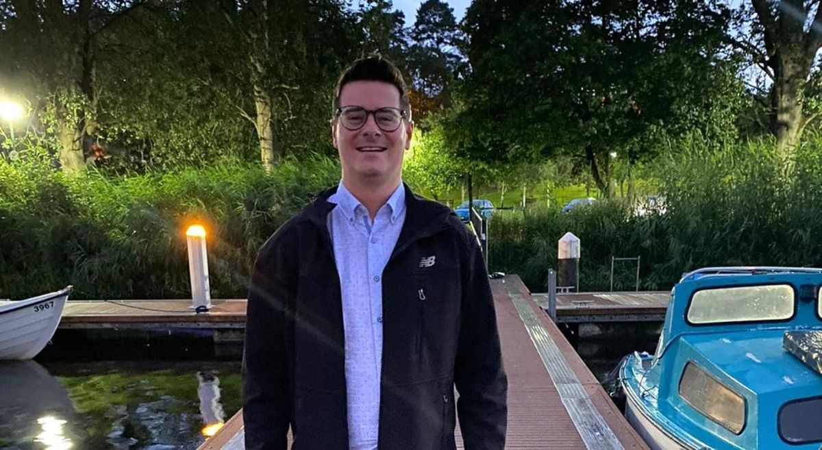 Local artist David Campbell pictured by a boat jetty.